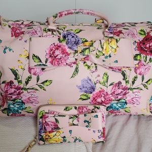 Floral duffel bag and matching wallet